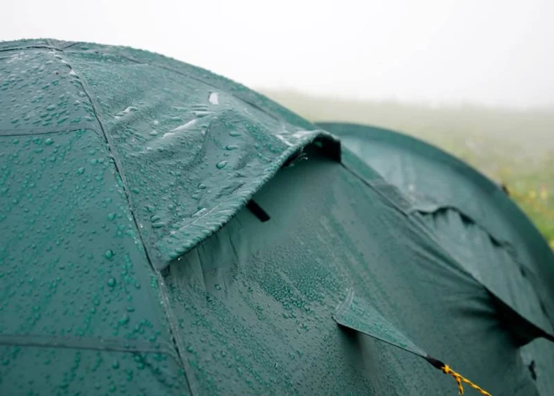 How to Waterproof Your Tent and Reapply DWR Coating | Camping Cabins