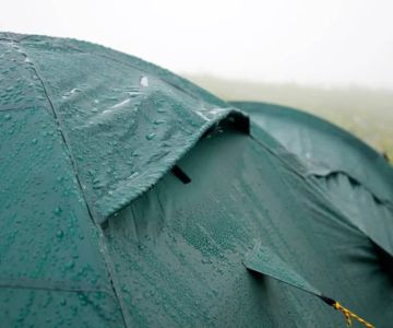 How to Waterproof Your Tent and Reapply DWR Coating | Camping Cabins